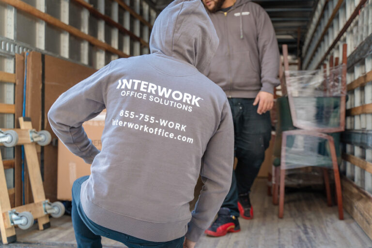Interwork Office Solutions moving furniture.