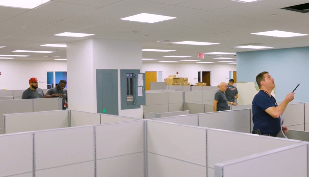 Office cubicle installation in progress.