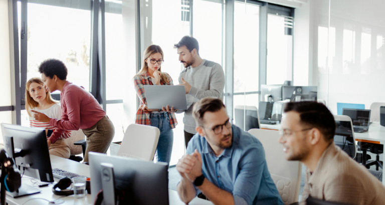 Team brainstorming in modern office.